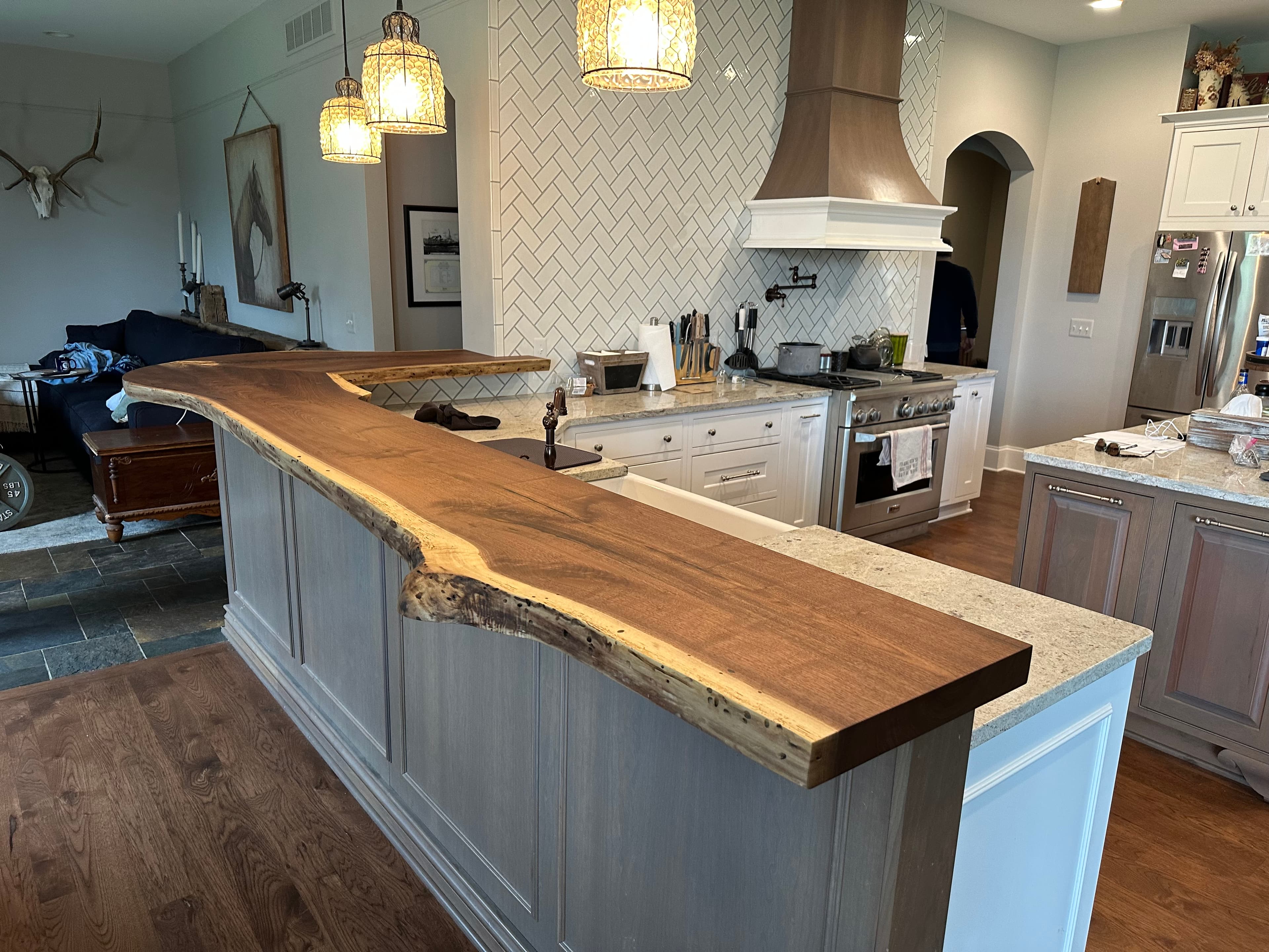 A finished live-edge black walnut piece installed in a client's home — Lineage Craft Co.